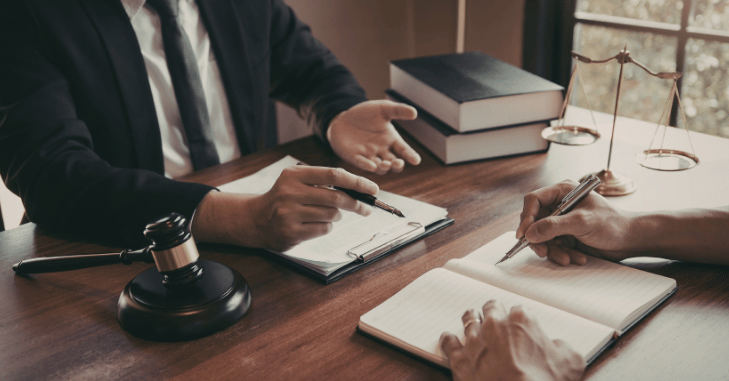 Legal team discussing an infringement case in a meeting